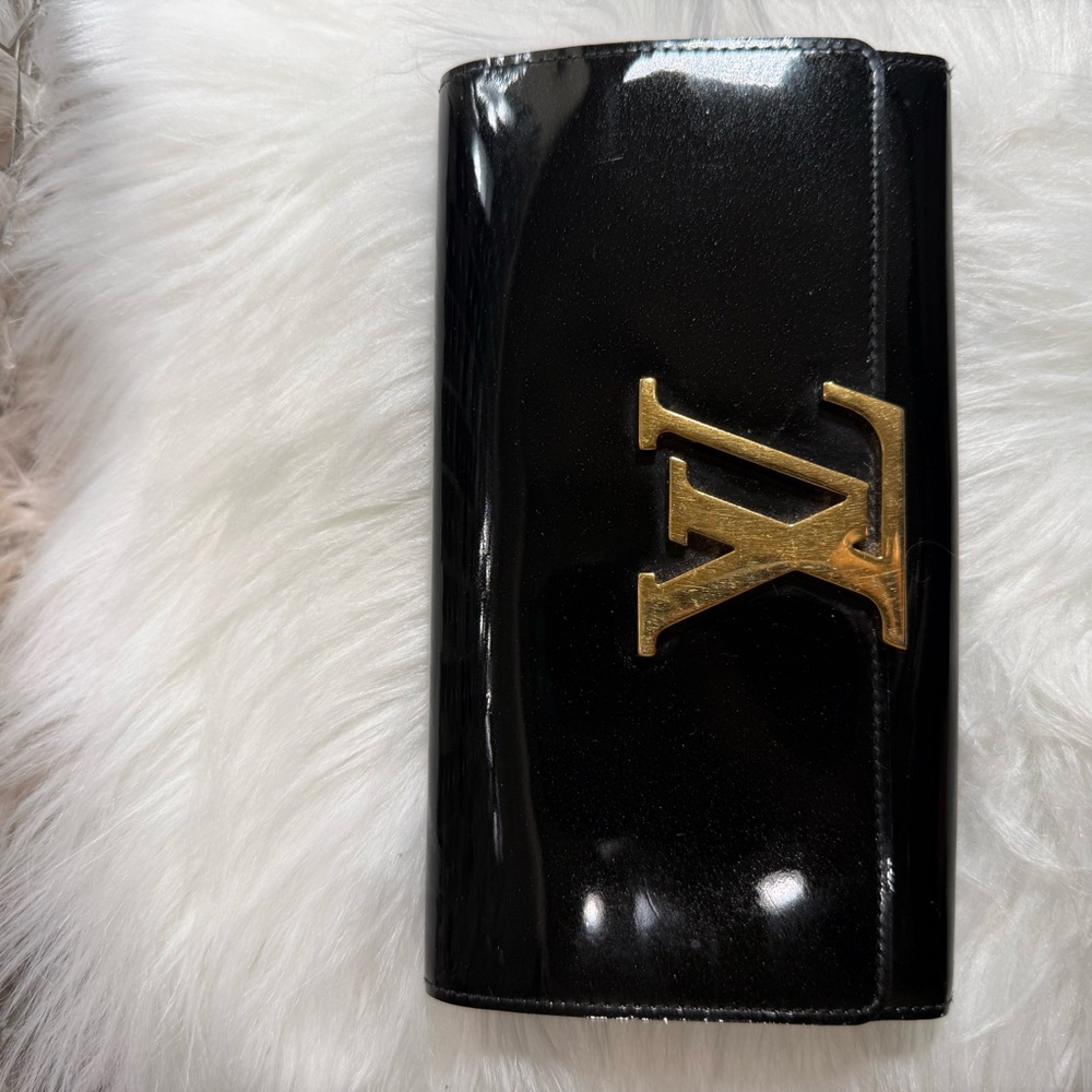 Louis Vuitton Black Wallet with Gold Accents